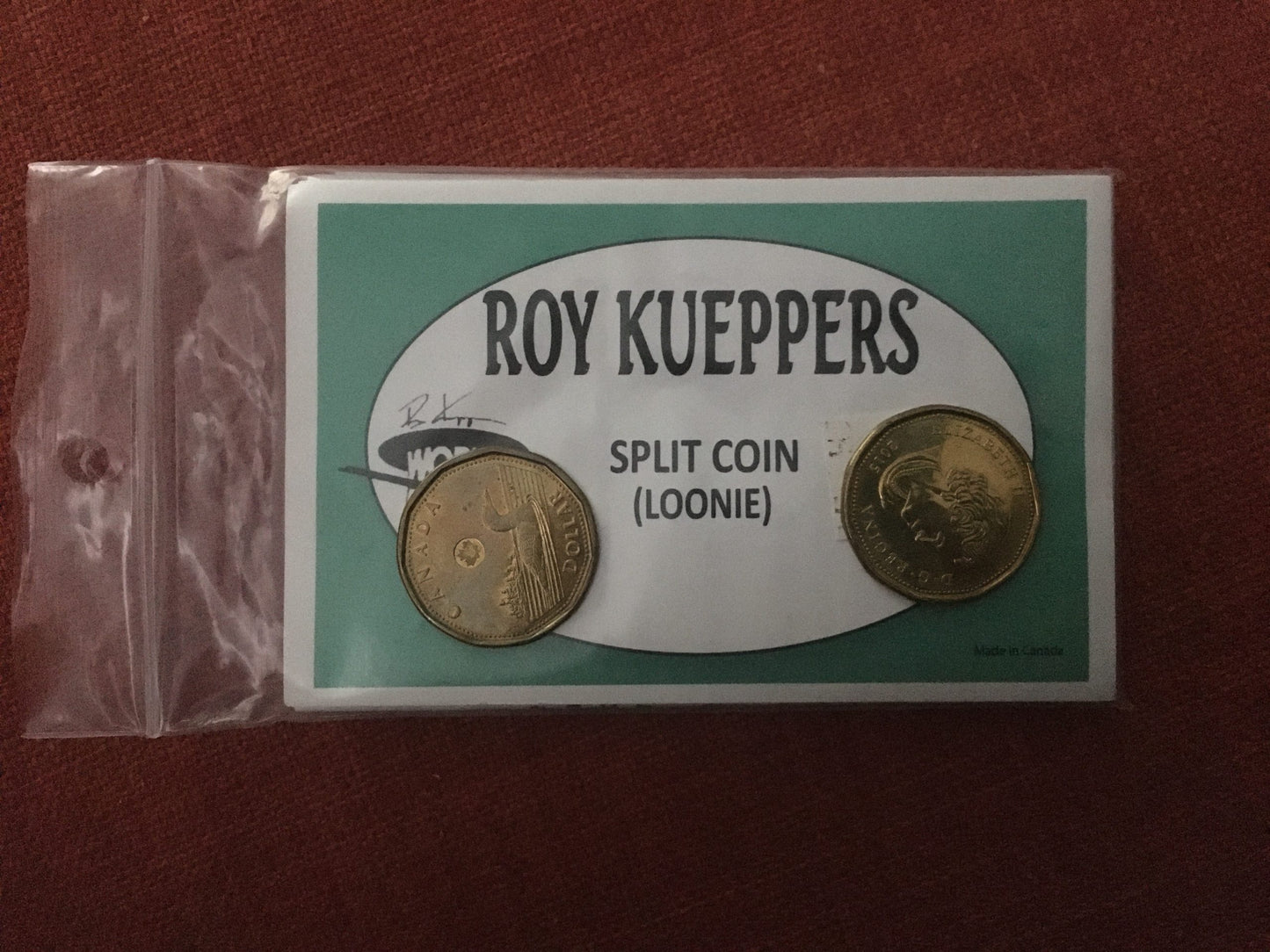 Split Coin Canadian, Loonie, by Roy Kueppers