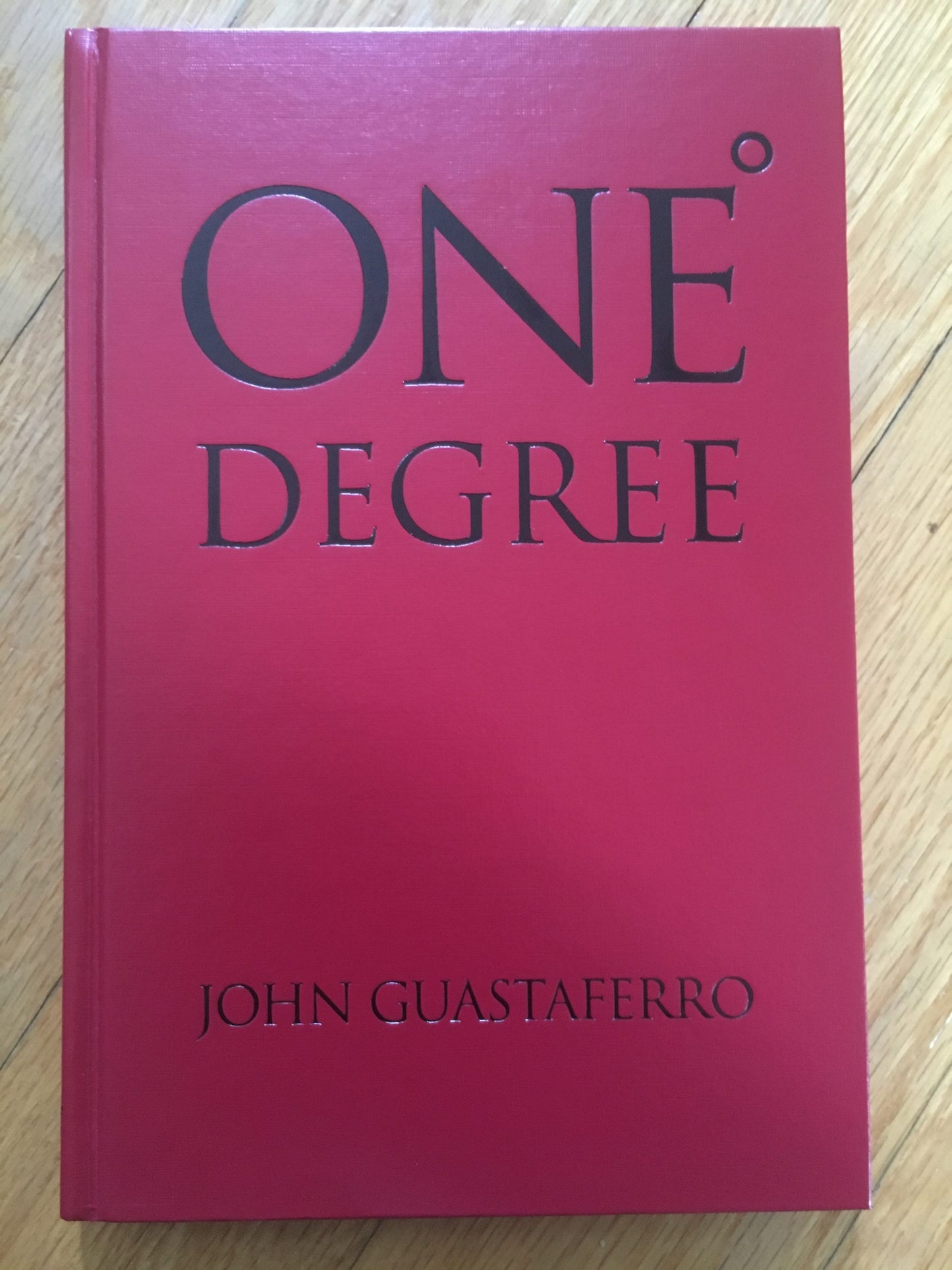 Un diplôme, John Gustavero